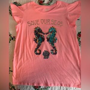 Great Condition SO shirt. Color neon pinkish/orange w/sea horses, size XL-14/16